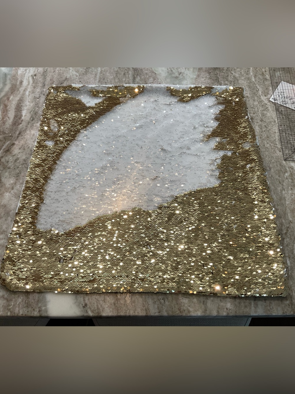 Gold and white sequined pillowcase